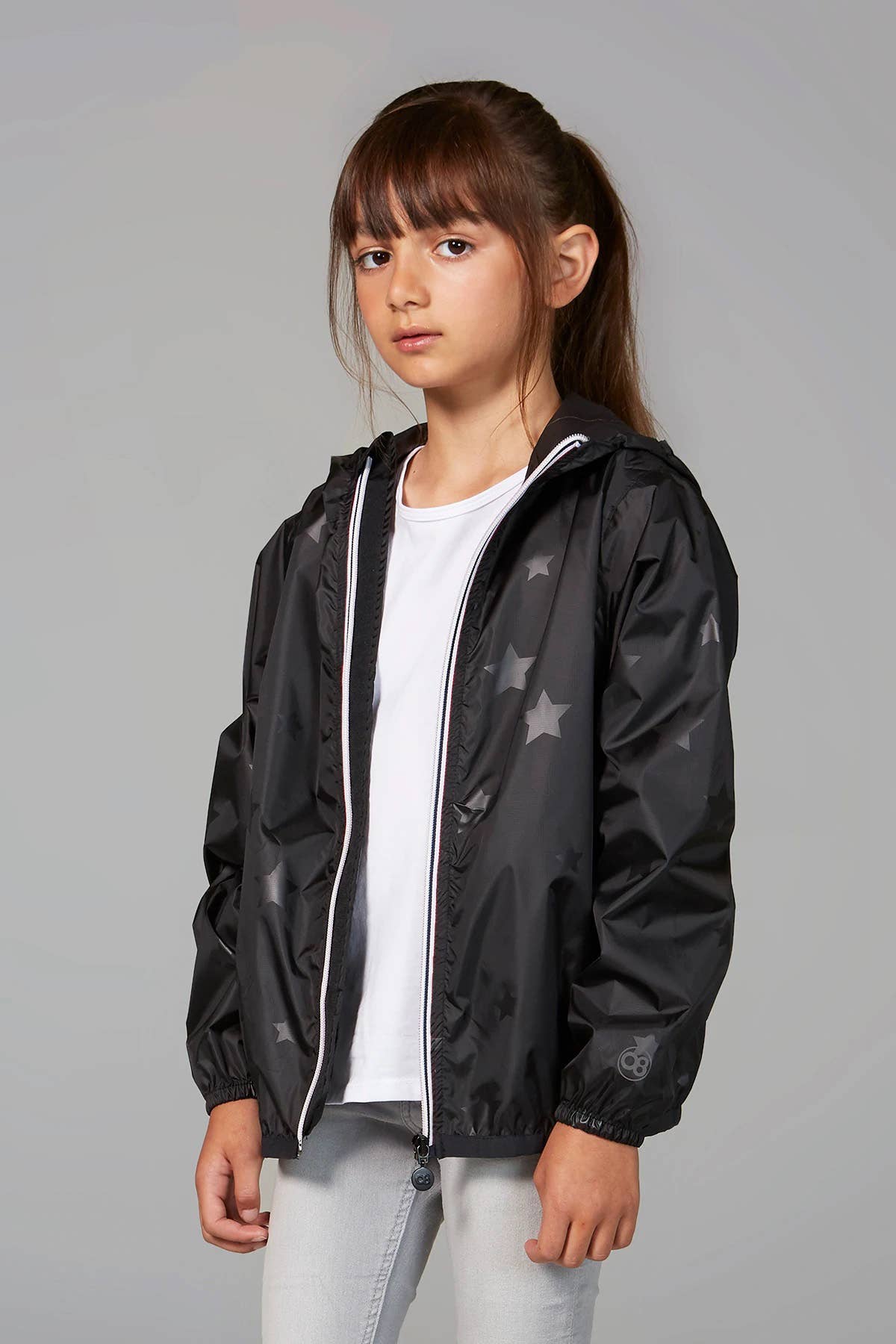 Kids black gloss stars packable rain jacket and windbreaker