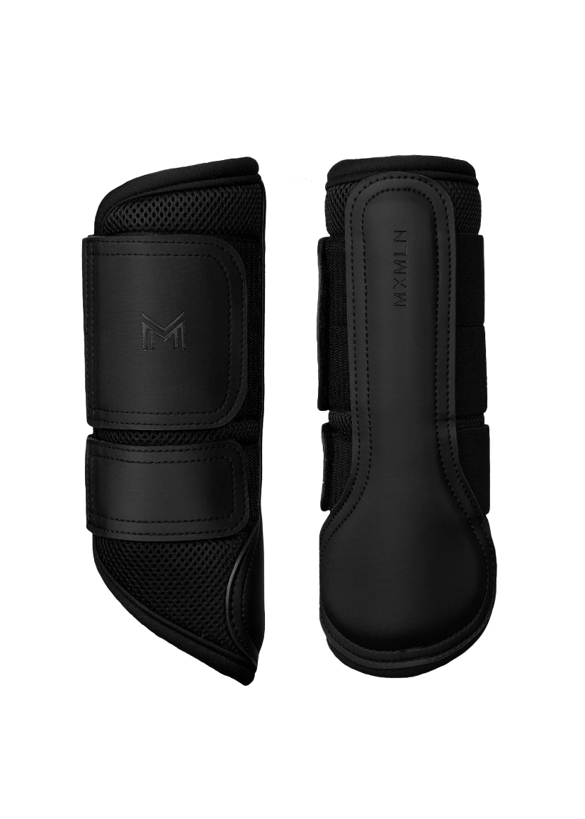 Maximilian Ego brushing boots