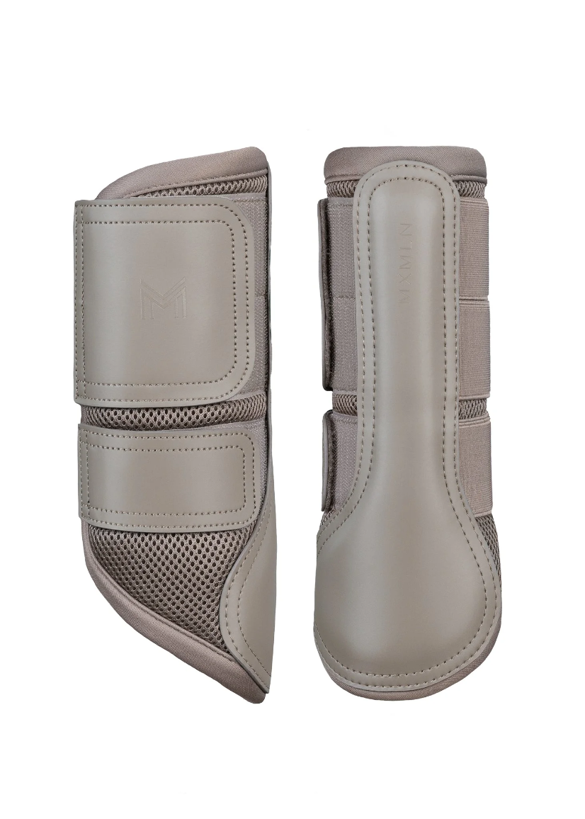 Maximilian Ego brushing boots